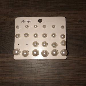 11 pairs of pearl earrings